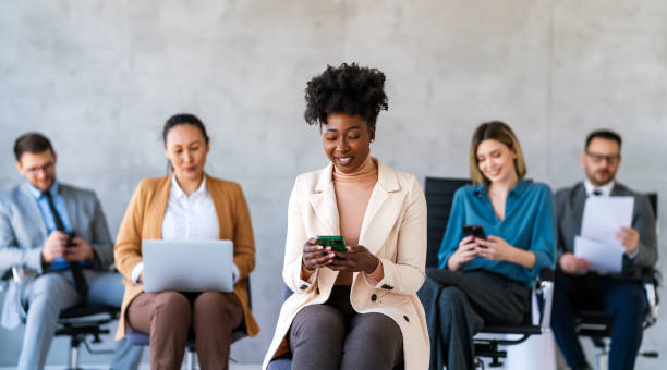 istock Group of young multi-ethnic startup business team collaborating on project in modern office 2188493093
