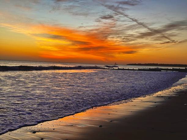 istock Sunrise colours reflected on Blyth beach in Northumberland 2188498005