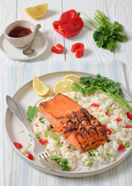 istock grilled red salmon fillet with rice, top view 2188498103