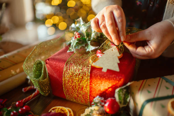 istock Woman preparing Christmas gifts 2188500628