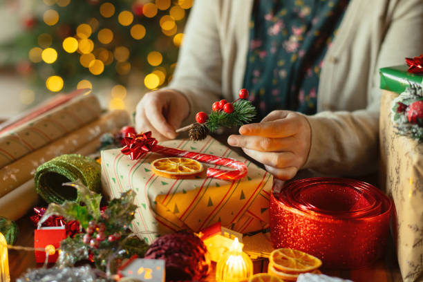 istock Woman preparing Christmas gifts 2188501313