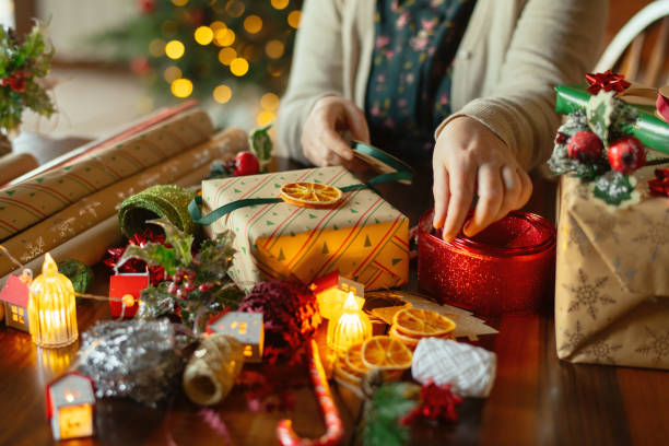 istock Woman preparing Christmas gifts 2188501327
