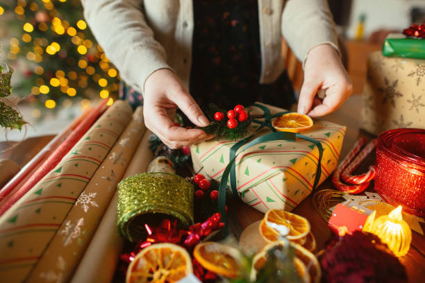 istock Woman preparing Christmas gifts 2188501358