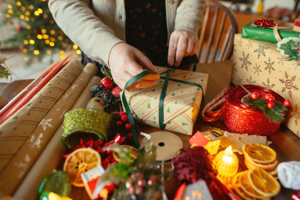 istock Woman preparing Christmas gifts 2188501376