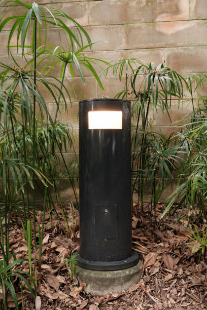 istock Black metal lamp in a garden 2188508964