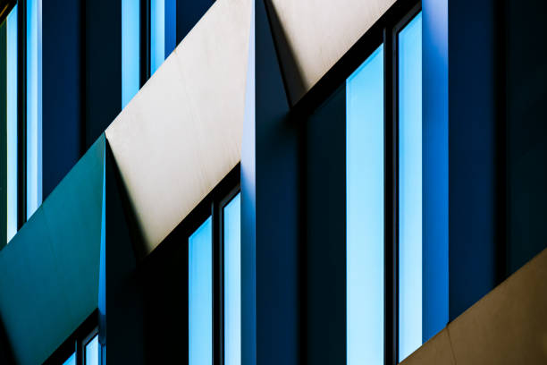istock Abstract Colorful Architectural Facade with Interplay of Light, Shadows, and Angular Geometric Patterns 2188513398