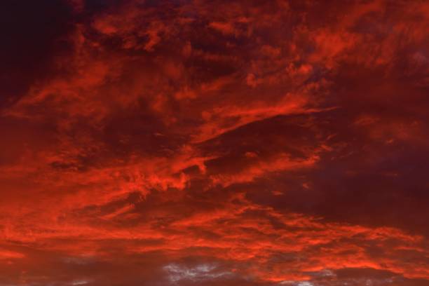 istock Dramatic sunset sky with vibrant red and orange clouds in Lima, Peru 2188515256
