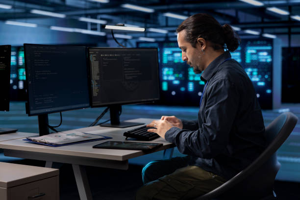 istock IT specialist monitoring blade servers for overheating problems 2188517825