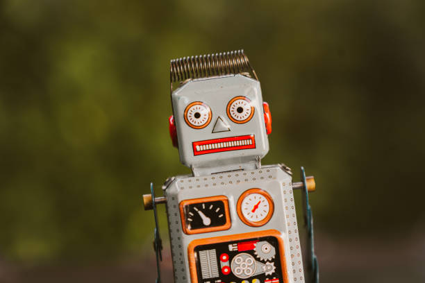 istock Vintage robot toy with expressive face and mechanical features, showcasing nostalgic design. Perfect for collectors and enthusiasts of retro items 2188520128