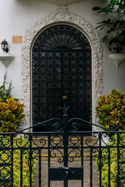 istock Ornate wrought iron gate and door 2188520139