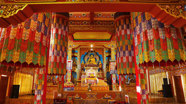 istock Inner sanctum of Thupsung Dhargye Ling Buddhist Monastery adorned with sacred artifacts and murals, Dirang, West Kameng, Arunachal Pradesh, India. 2188525295