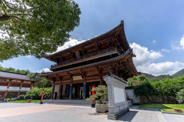 istock Blue sky and white clouds, Chinese Buddhist architecture on green spaces 2188526414
