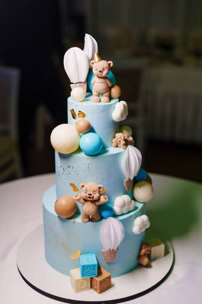 istock Large blue three-tiered teddy bear cake for a children's birthday party. 2188526462
