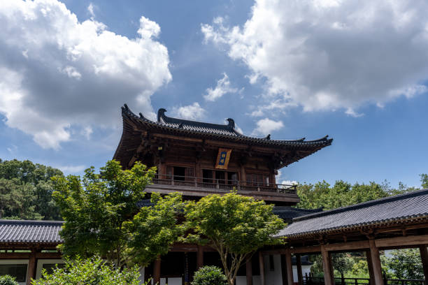 istock Blue sky and white clouds, Chinese Buddhist architecture on green spaces 2188526524