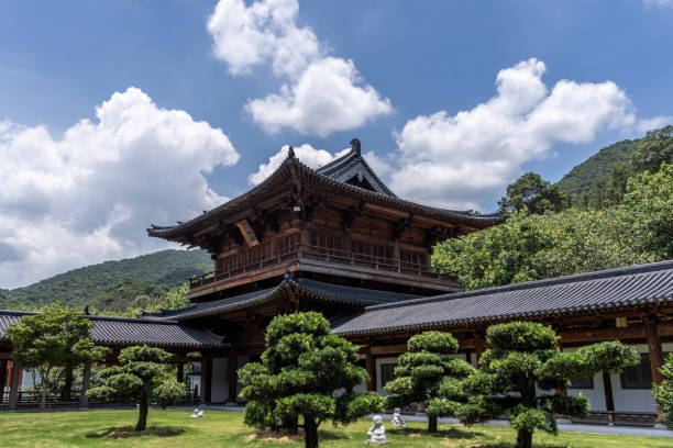 istock Blue sky and white clouds, Chinese Buddhist architecture on green spaces 2188526881