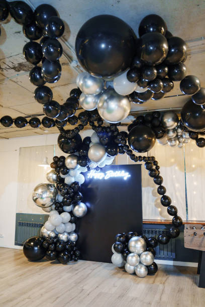 istock Festive birthday decor with silver and black balloons 2188529244