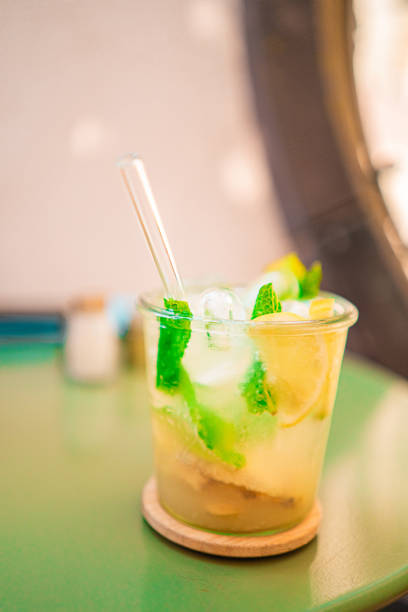 istock Refreshing Summer Mojito with Lime and Mint Served in a Glass on a Green Table, Perfect for a Relaxing Afternoon or Summer Party 2188530337
