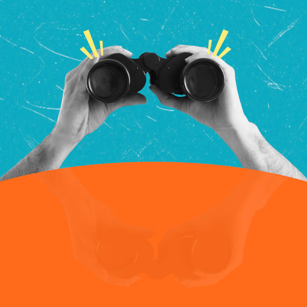 istock Contemporary art art collage depicting a hand with binoculars and reflection. 2188538733