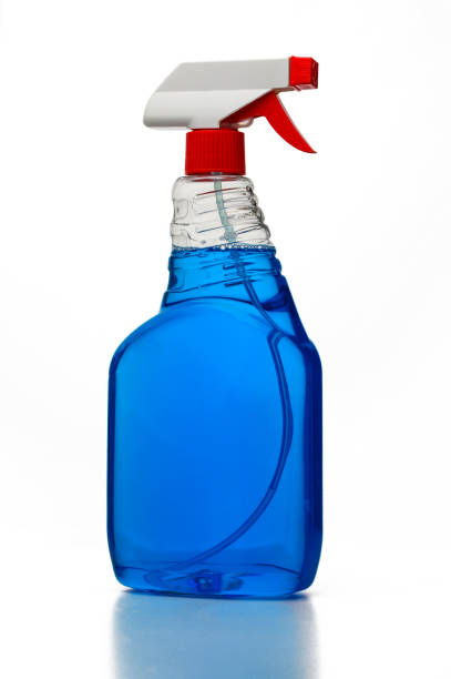 istock Creative cleaning with a vibrant blue spray bottle at home 2188540061