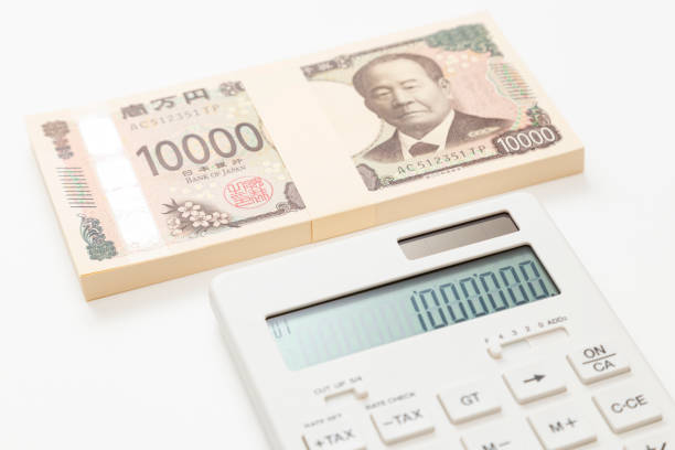 Calculator and 1 million yen on white background