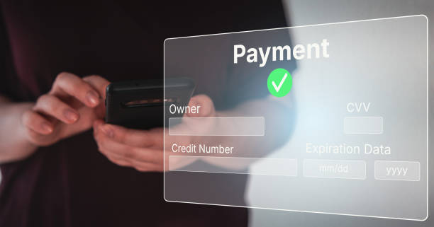 istock Woman holds mobile with banking interface on smartphone for payment. 2188544167