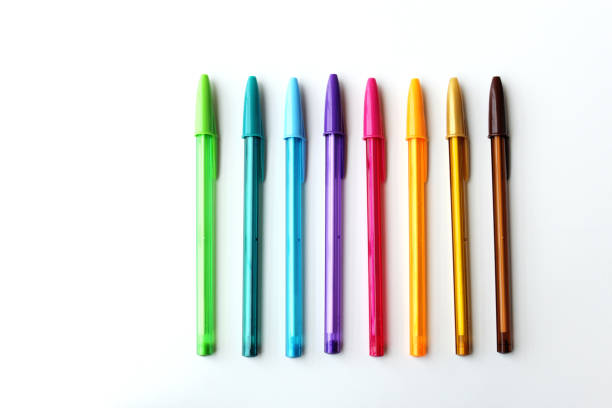 istock Colorful pens arranged side by side on white background. 2188547220