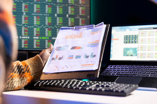 istock Person examining capital funds online for a new program at home 2188553815