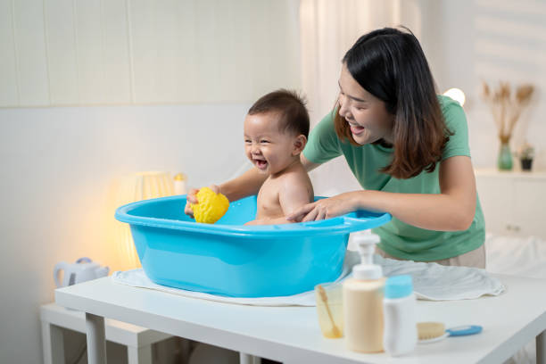 istock Asian baby taking a bath at home 2188565425