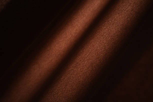 Soft fabric texture in a rich mocha-mousse tone, smooth and plush surface.