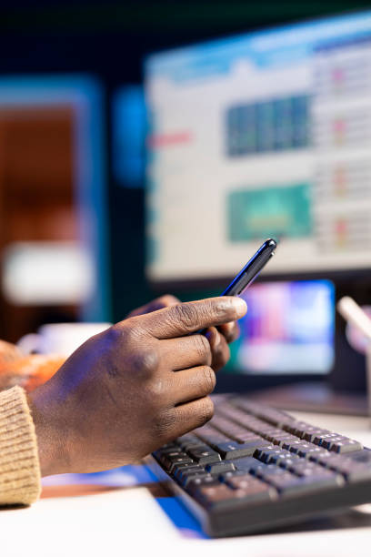 istock African american man takes a break from work to answer emails and texts 2188574990