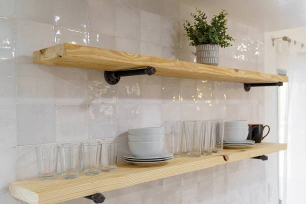 istock Wooden Shelves with Industrial Pipe Brackets and Kitchenware 2188576470