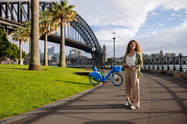 istock Woman sightseeing in Sydney using a citibike 2188580375