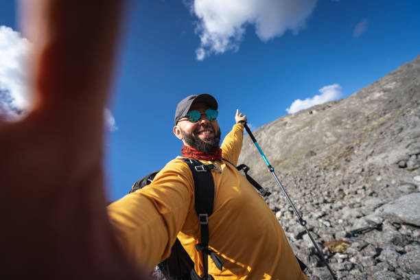 istock Happy Hiker Taking a Selfie on a Mountain Trail 2188581401
