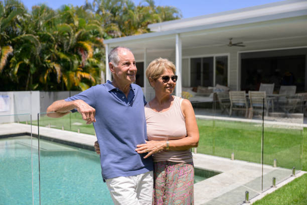 istock Retired couple enjoying sunshine in Byron Bay back yard 2188582115