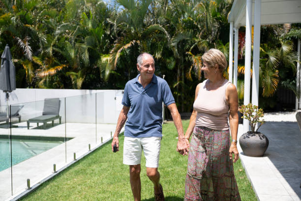 istock Cheerful couple in sunny Byron Bay back yard 2188582120