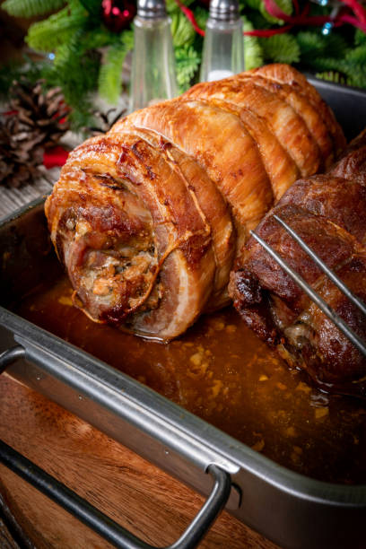 istock Baked bacon roulade and roasted pork neck. 2188584015