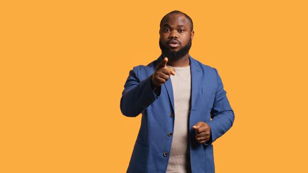 istock Upset person in disagreement with mate, pointing finger and lecturing him 2188585262