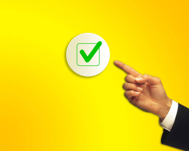 Hand with checklist icon for successful target goal business management, business strategy planning management. Business process and workflow development, survey and quality control assessment.