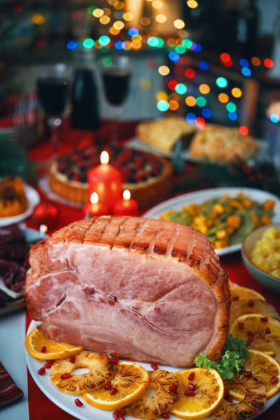 istock Christmas Dinner with Baked Glazed Ham and Various Vegetables 2188592823