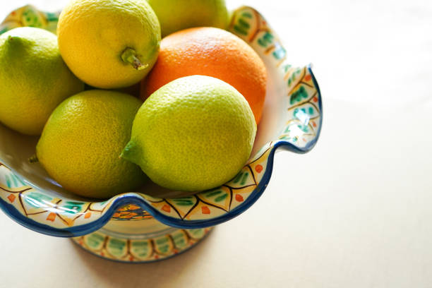Hand-painted fruit serving bowl from Sicily, Italy with orange and lemons