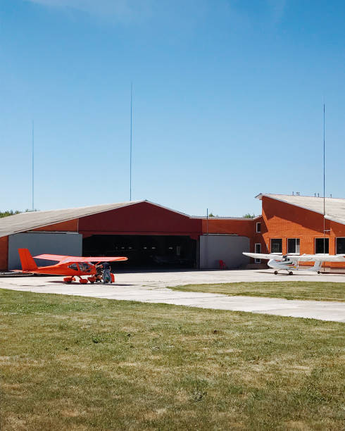 Pilot preparing an ultralight plane for a flight