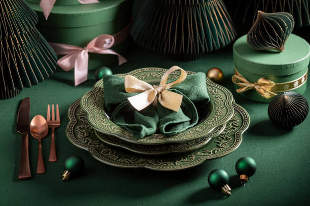 istock Modern bottle green table set for Christmas with presents 2188603871
