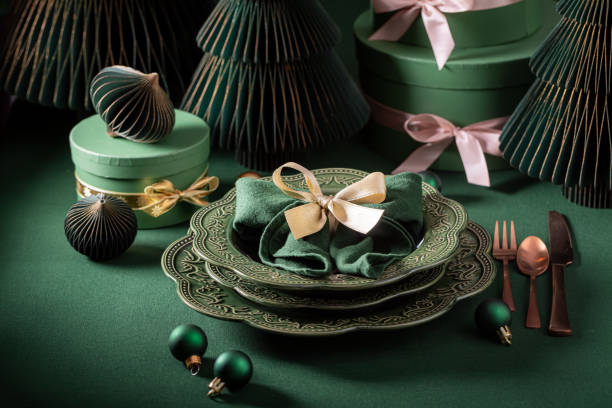 istock Beautiful bottle green Christmas tableware as gift card. 2188604137