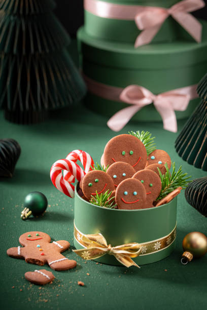 istock Cute Christmas gingerbread mans as snack in Christmas gift. 2188604152