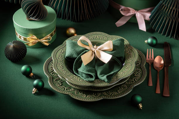 istock Modern bottle green table set for Christmas as gift card. 2188605050