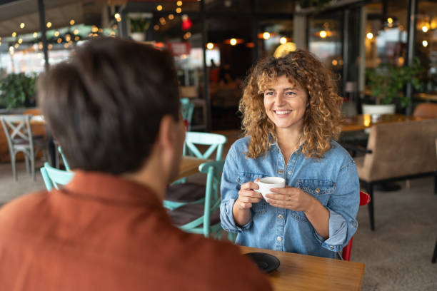 istock Happy couple enjoying at cafe 2188606216