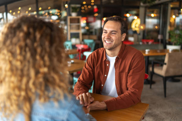 istock Happy couple in cafe 2188609428