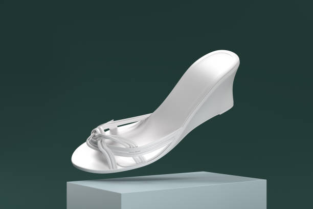 istock A white shoe with a bow on the side is shown in a 3D image 2188609462