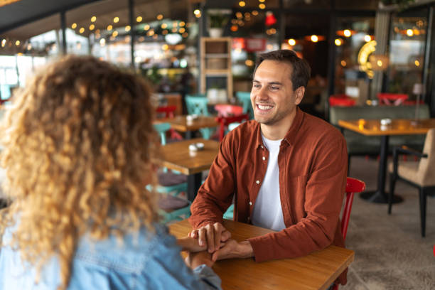 istock Happy couple in cafe 2188609475