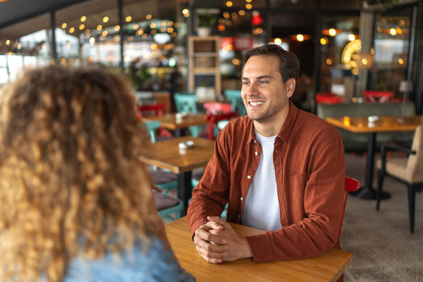 istock Happy couple in cafe 2188609575